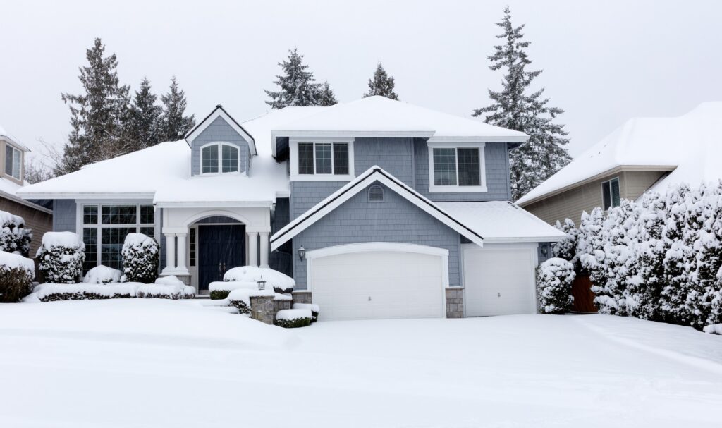Exterior of a home blanketed in snow